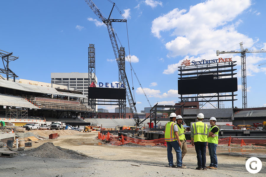 Our tour group stands near where home plate eventually will be in SunTrust Park. Georgia Tech alumni Adam Cobb, Adam Karabenli and Kyle Manweiler are among the leaders on the project.