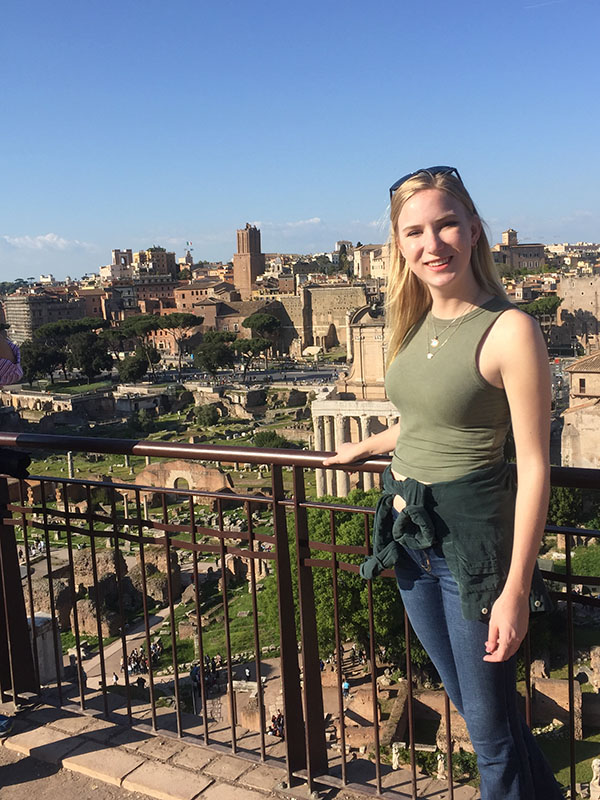 Claire Anderson In front of the Roman forum in Rome.