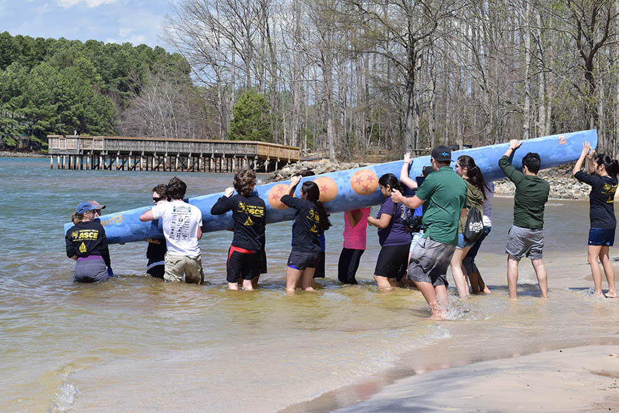 Georgia Tech ASCE's concrete canoe team load their creating into a lake to test its buoyancy at the Carolinas Regional Conference March 31. Weather conditions canceled the traditional (and usually entertaining) canoe races at the conferece. (Photo: Thomas S. Teichmann)