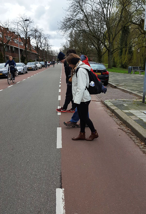 Students measure bike lanes in Delft, Netherlands, during their trip with Kari Watkins' Sustainable Transportation Abroad course. (Photo: Kari Watkins)