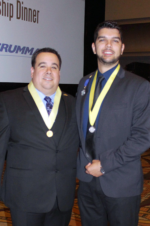 Ph.D. student Osvaldo Broesicke, right, with Latinos in Science and Engineering President Will Davis. Broesicke won the organization's highest honor for students, the Padrino Scholarship and Medalla de Plata, or silve medal. (Photo Courtesy: Osvaldo Broesicke)
