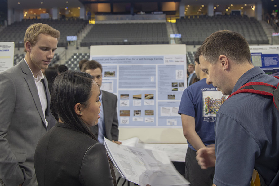 Kaitlyn Wong explains TEZA Building Solutions’ plans for an undeveloped parcel in Fayetteville, Georgia, at the spring 2019 Capstone Design Expo. (Photo: Amelia Neumeister)