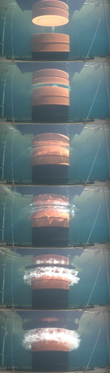 This series of photos shows the volcanic tsunami generator simulating a volcanic eruption by “punching” through the water’s surface. Professor Hermann Fritz built this one-of-a-kind setup and conducted a series of experiments to better understand tsunamis created by eruptions of underwater volcanoes. (Photos: Yibin Liu)
