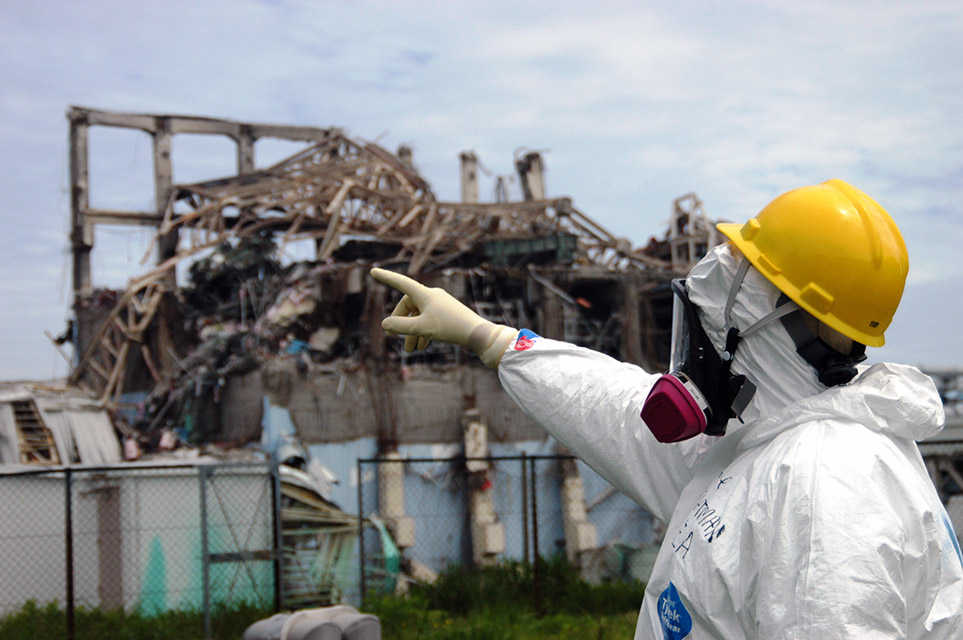 International Atomic Energy Agency fact-finding team leader Mike Weightman examines Reactor Unit 3 at the Fukushima Daiichi Nuclear Power Plant on May 27, 2011. The team assessed damage from an earthquake and tsunami in March 2011 that caused three reactors at the plant to meltdown. (Photo: Gregg Webb / International Atomic Energy Agency)
