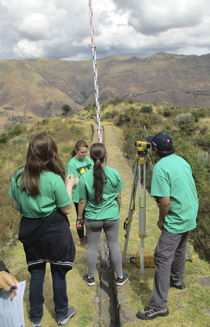 A group of students surveys a dry Incan canal at the religious and agricultural site Tipon in Peru. The group, including Georgia Tech senior Maya Goldman, used a well-known hydraulic modeling software to compare the trial-and-error method of Inca engineers to modern empirical equations. (Photo: Maya Goldman)
