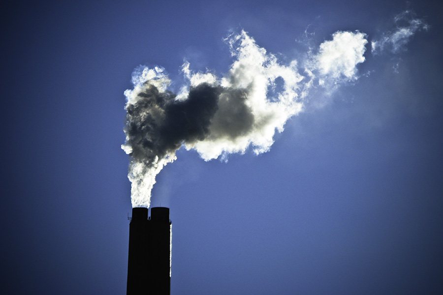 Power plant smoke stacks. A new study led by Tellepsen Chair Armistead "Ted" Russell found that power plant and motor vehicle pollution regulations resulted in better air quality and fewer emergency hospital visits for Atlanta area residents for respiratory problems. (Photo Courtesy: Nick Humphries via Flickr.)