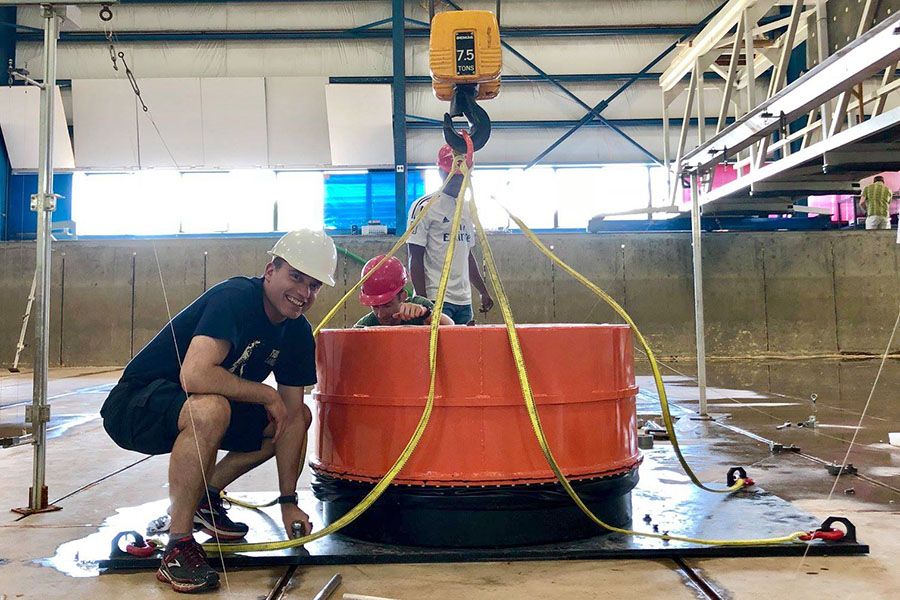 Hermann Fritz helping install the Volcanic Tsunami Generator at the O.H. Hinsdale Wave Research Laboratory at Oregon State University earlier this summer. (Photo: Angela Del Rosario / Courtesy: Natural Hazards Engineering Research Infrastructure)