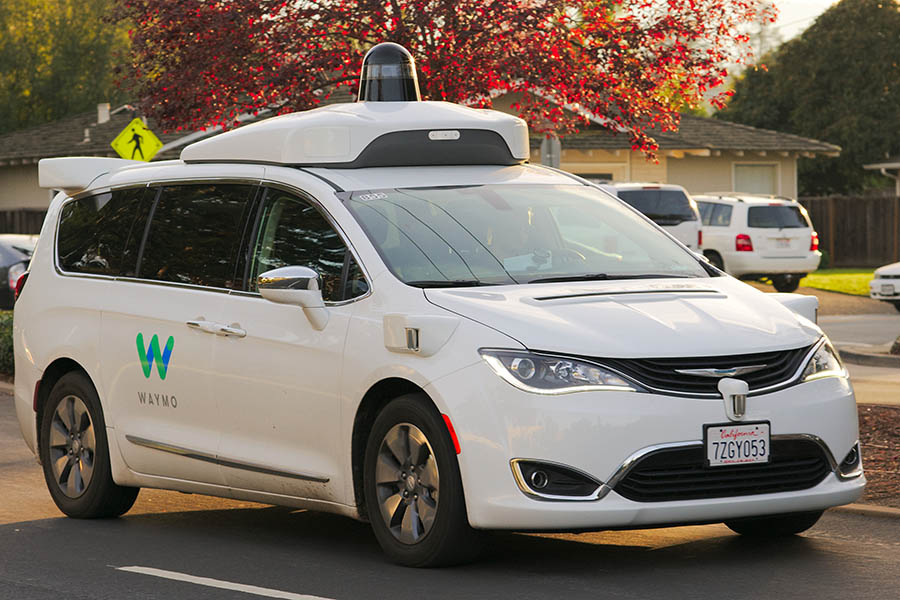 An autonomous Waymo Chrysler Pacifica drives around Los Altos, California. School of Civil and Environmental Engineering researchers Kari Watkins and Michael Hunter suggest in a Newsweek essay that widespread adoption of driverless vehicles will not automatically solve the nation’s traffic problems. They argue policymakers need to start building the framework now to encourage a shared-ride culture so people can actually get to their destinations more quickly in autonomous cars. (Photo Courtesy: Dllu [CC BY-SA 4.0] via Wikimedia Commons)