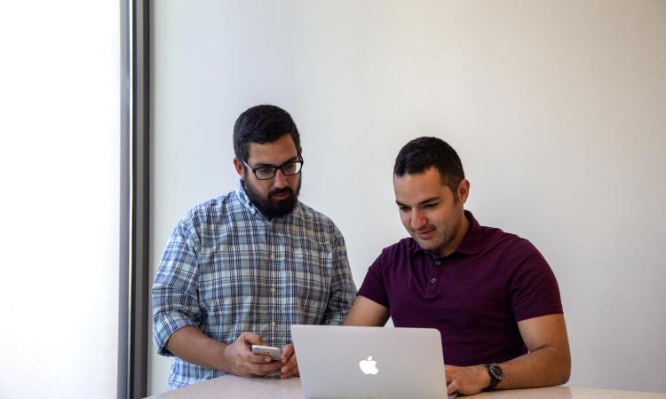 students working at a computer