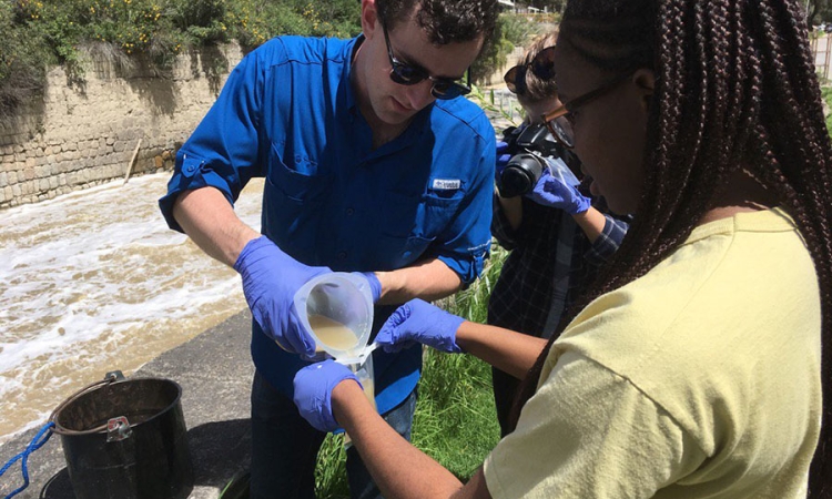 Students collect samples along the Choqueyapu River in La Paz, Bolivia, over spring break. They were one of three classes that traveled to three different continents this year. (Photo Courtesy: Joe Brown)