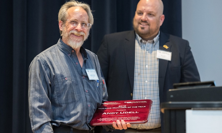 School of Civil and Environmental Engineering Facilities Manager Andy Udell holds a his Building Manager of the Year plaque March 19 at Georgia Tech's Building Manager Symposium. (Photo: Allison Carter)