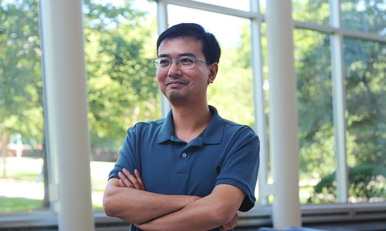New faculty member Xing Xie stands in the lobby of the Ford Environmental Science and Technology Building. (Photo: Jess Hunt-Ralston)