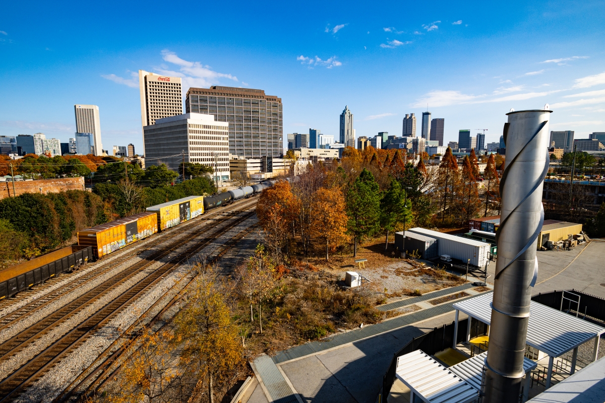 A view of the Atlanta skyline over railroad tracks 