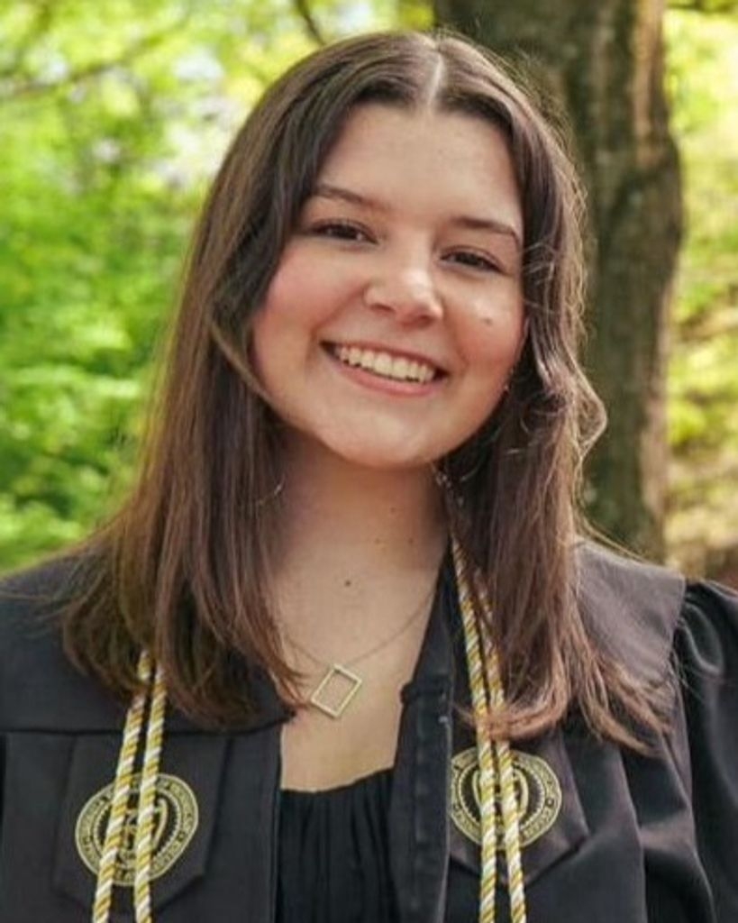 A woman in a graduation robe