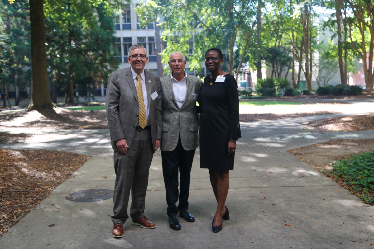 School chair Don Webster, Hyatt speaker Ron Blum, Associate chair Adjo Amekudzi-Kennedy