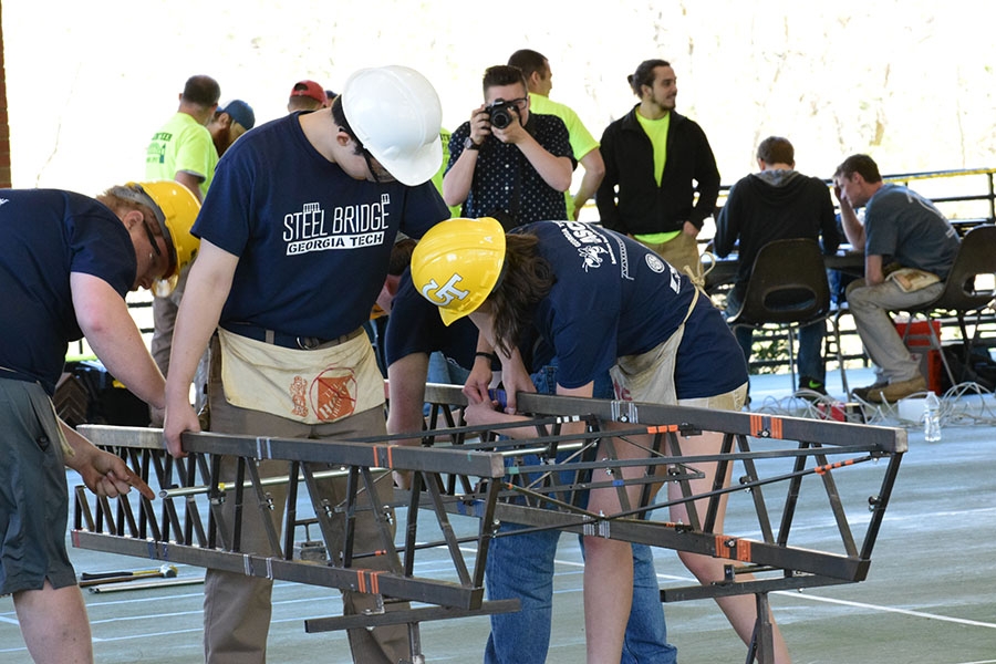 Members of the ASCE steel bridge team put together their design at the Carolinas Regional Conference for student chapters April 1. The team, led by Colin Martin and Mihai Mavrodin, won first place and advance to national competition in May. (Photo: Thomas S. Teichmann)