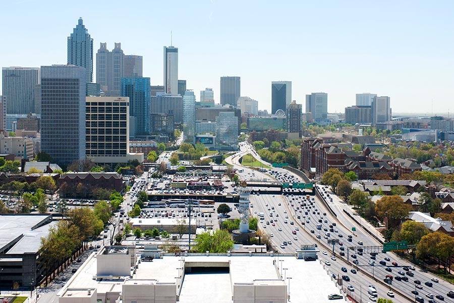 Downtown Atlanta skyline with traffic on the I-75/I-85 Downtown Connector. (Photo: Fitrah Hamid)