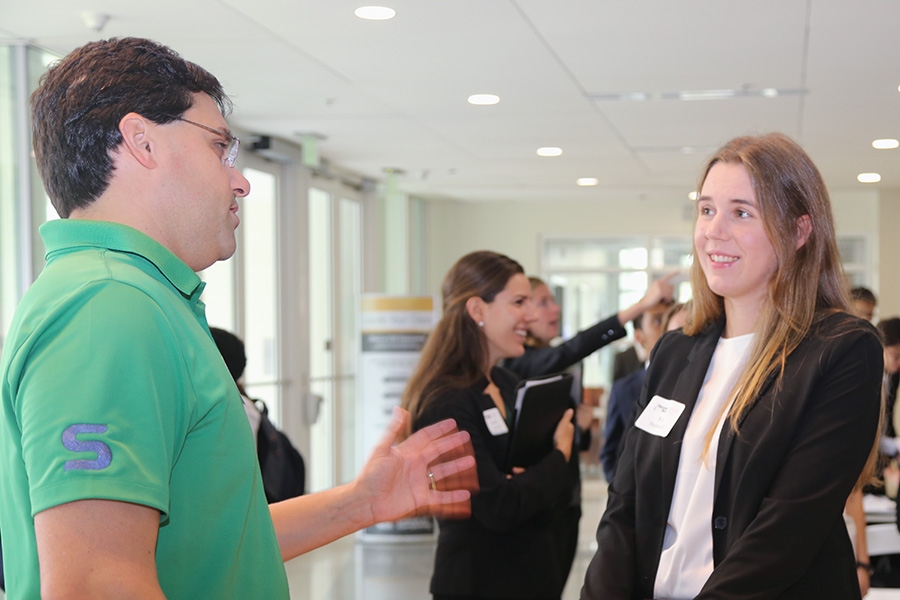 Skanska’s Jimmy Mitchell talks with a student at the School’s 2017 Career Expo. Mitchell, a 2005 civil engineering grad, has long been involved in mentoring Tech students. The School has launched a new program to involve more alumni in these kinds of relationships and is recruiting professionals and students. (Photo: Jess Hunt-Ralston)