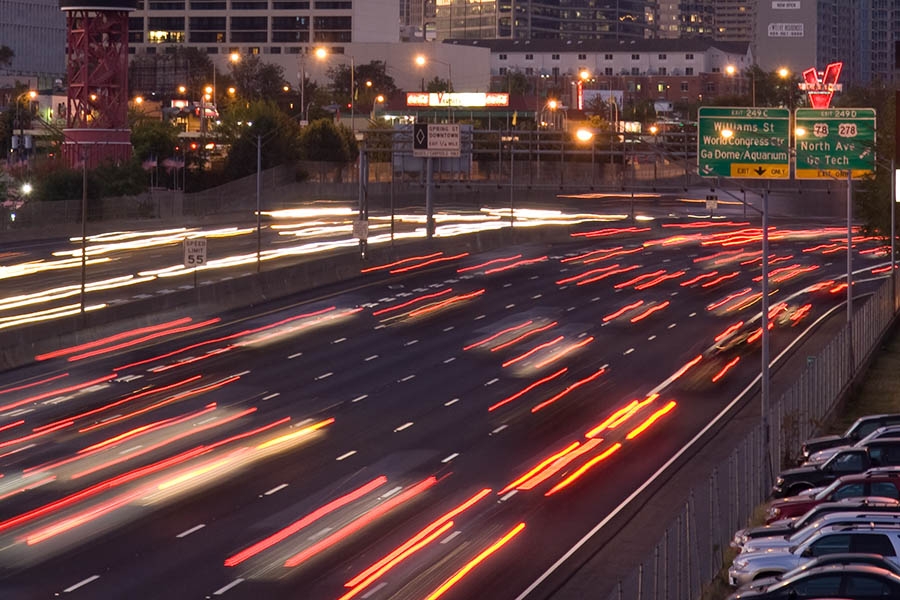 Cars speed along the Interstate 75/Interstate 85 Downtown Connector in Atlanta. (Photo: Rob Felt)