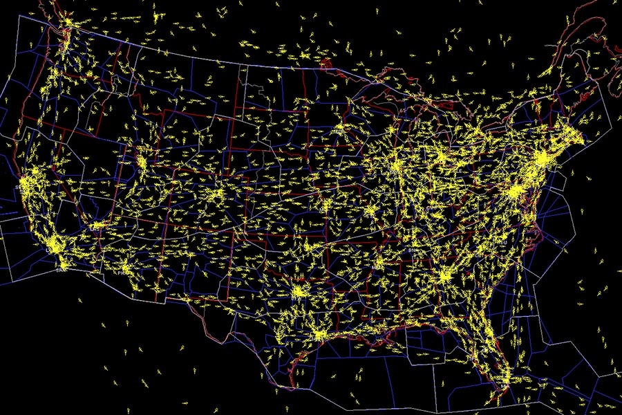 This image from software developed by NASA shows air traffic across the United States. Assistant Professor Sam Coogan has received funding from the U.S. Air Force to use new techniques to understand and manage how physical networks with interconnected components function. His work applies to all kinds of systems, like roads, airspace, water systems and factories. (Image Courtesy: NASA)