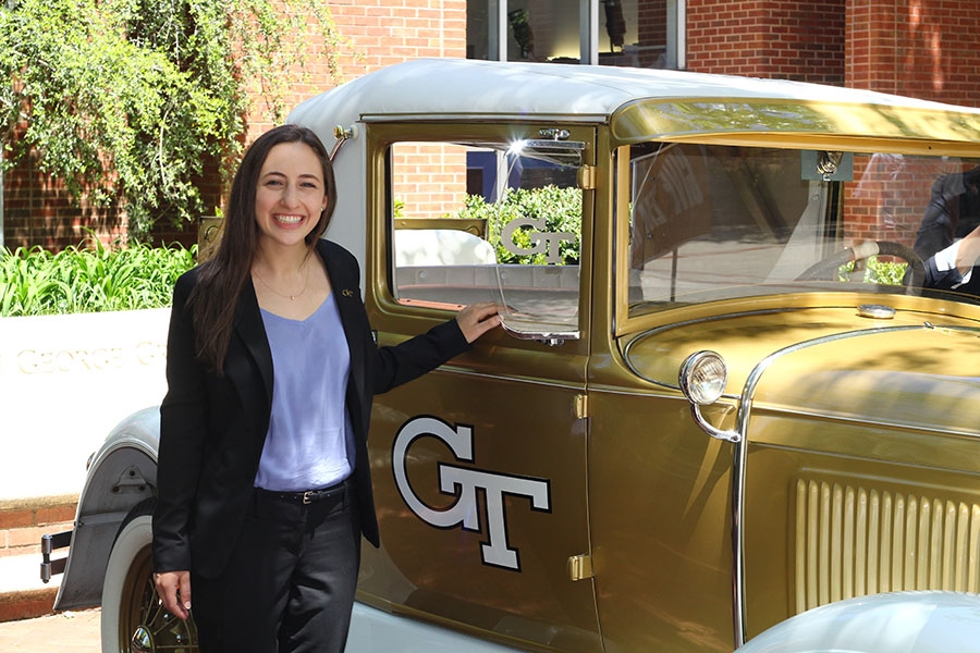 Hannah Greenwald poses for the traditional senior photo with the Georgia Tech Ramblin' Reck. Greenwald has won the top honor for Tech engineering students, the Davidson Family Tau Beta Pi Senior Engineering Cup. (Courtesy: Hannah Greenwald)