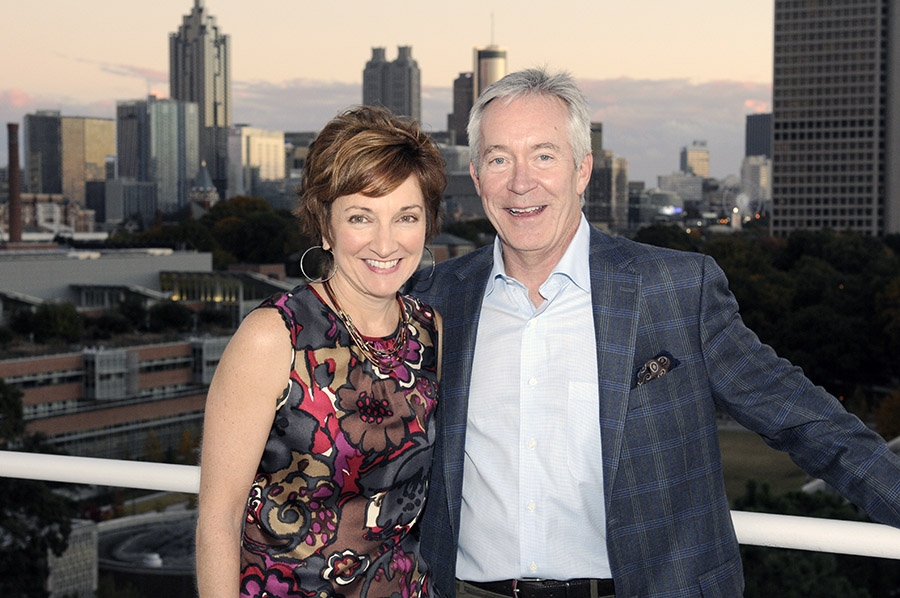 Elizabeth and Bill Higginbotham at dusk with the Midtown Atlanta skyline in the background. (Photo: Gary Meek)