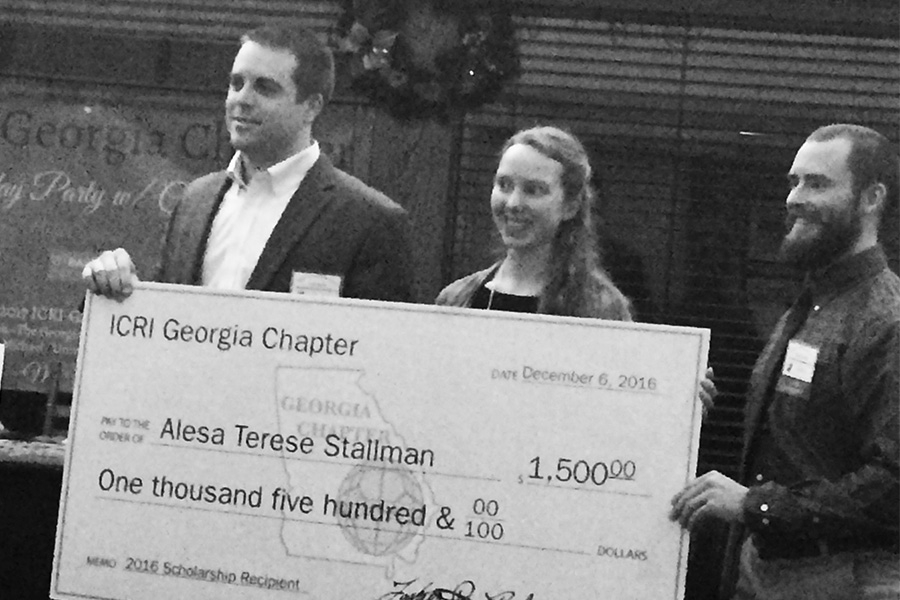 Alesa Stallman accepts a scholarship from the International Concrete Repair Institute Georgia Chapter Dec. 6. (Photo Courtesy: Alesa Stallman)