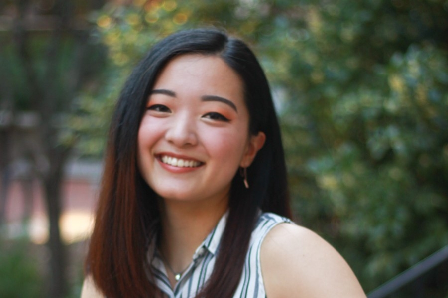 Zoe Zhang smiles for a photograph.