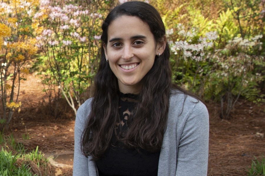 Emily Sanders smiles for a photograph. 